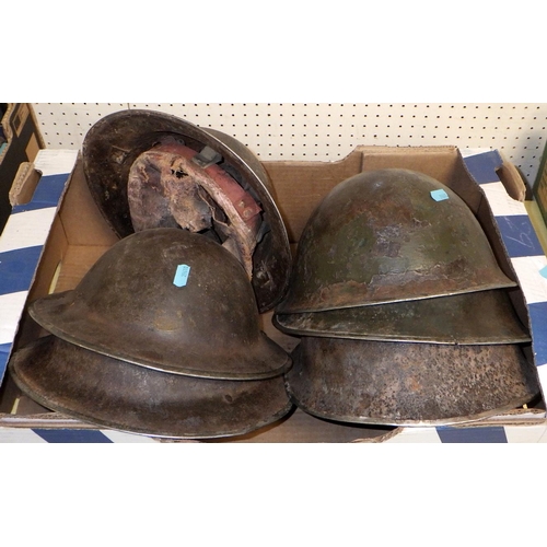 38 - Six tin helmets