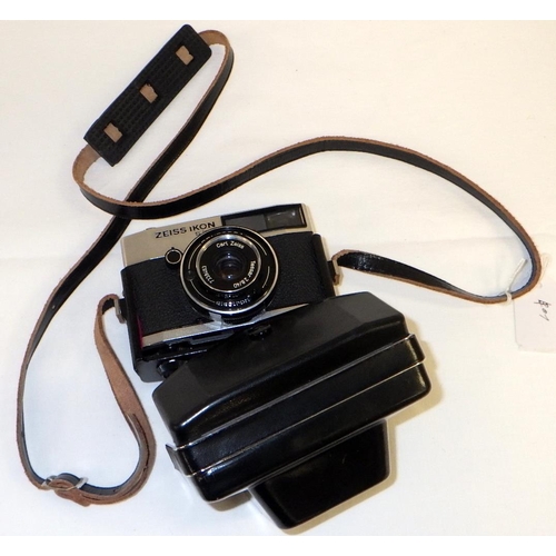 4 - A Zeiss Ikon S310 35mm compact camera in black leather ever-ready case.