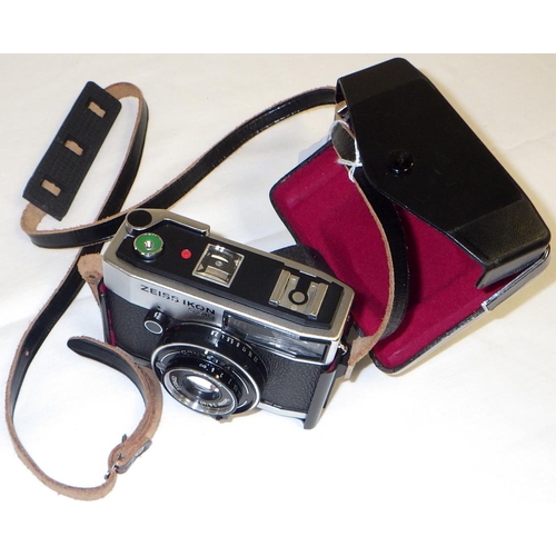 4 - A Zeiss Ikon S310 35mm compact camera in black leather ever-ready case.