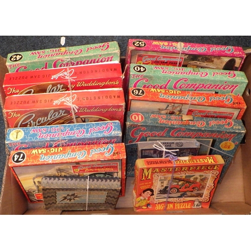 50 - Two boxes of various vintage jigsaw, af play worn (2)