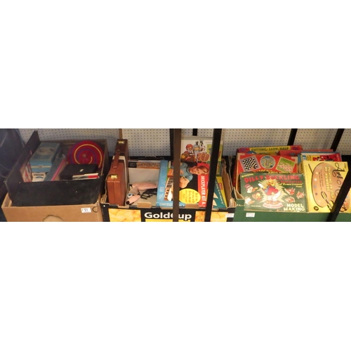 51 - Three boxes of various vintage games, af play worn