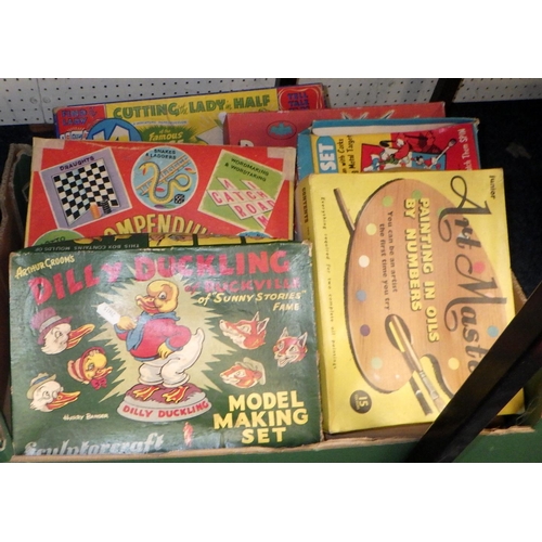 51 - Three boxes of various vintage games, af play worn