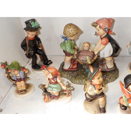 9 - A Group of nine Goebel figures