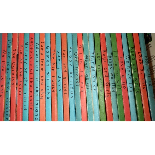 63 - A collection of various children's books to include Ladybird etc together with a Christening gown (1... 