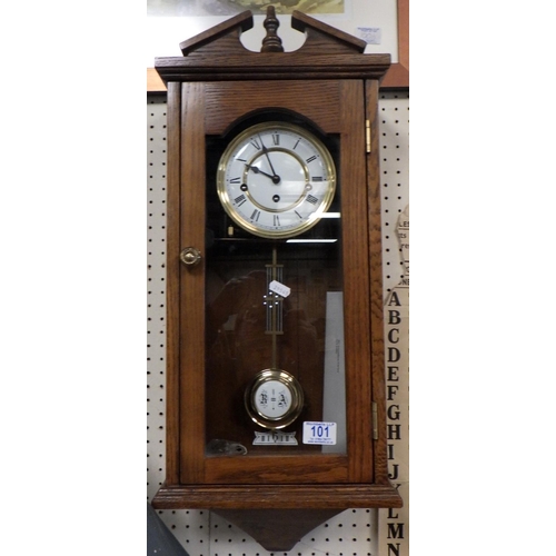 101 - A modern oak cased Westminster chime wall clock, recent service at the cost of £200