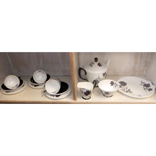 14 - A Royal Albert Masquerade tea set comprising of Tea pot, sugar bowl, milk jug, sandwich plate and si... 