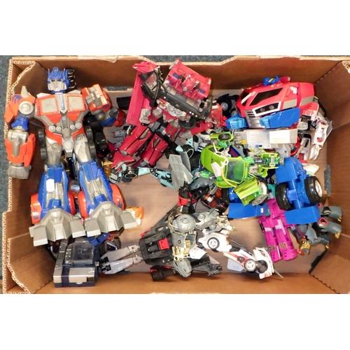 144 - A large qty of Transformer toys / figures (4)