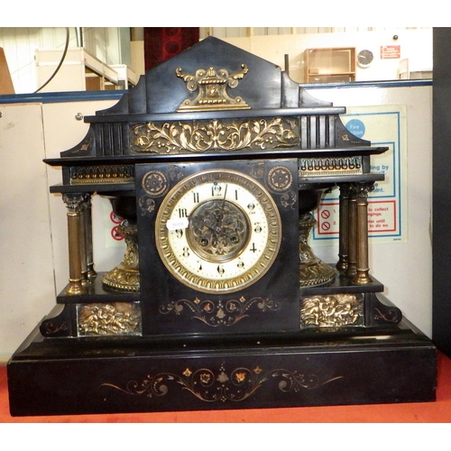 202 - A large black slate mantle clock 50cm wide 44cm tall