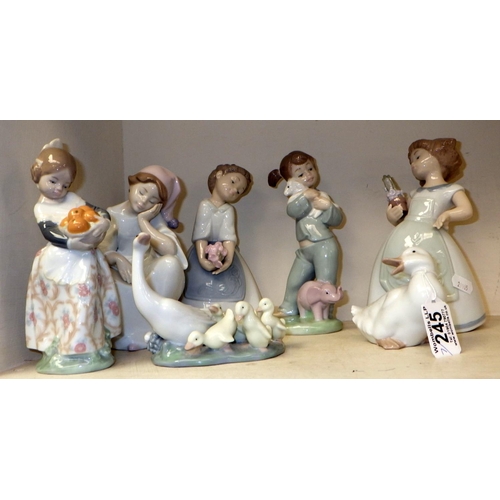 245 - Three Lladro figures together with Four Nao figures (7)