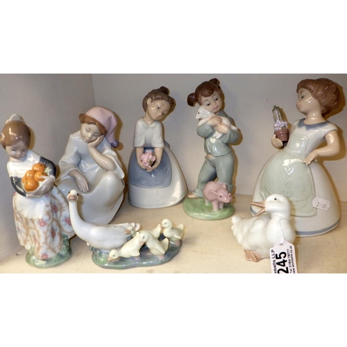 245 - Three Lladro figures together with Four Nao figures (7)