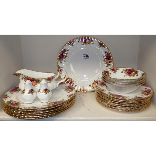 246 - A large qty of Royal Albert country Rose to include dinner plates, side plates, bowls, trinkets toge... 