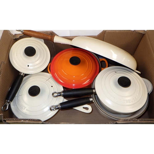 152 - A group of Le Creuset pans to include Le Creuset Wok, crack to a lid