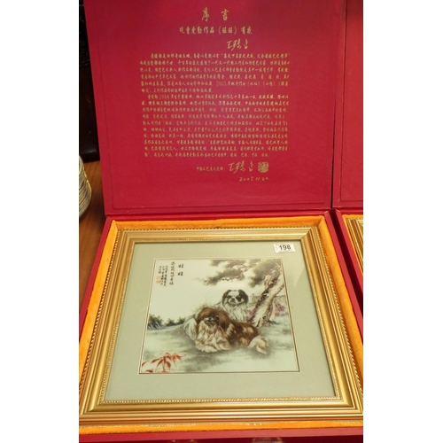 198 - Two Oriental framed and cased plaques 40cm x 40cm (2)