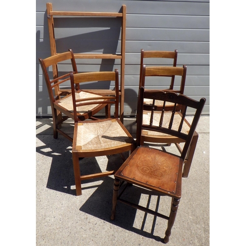 946 - A set of four dining chairs with rush drop in seats, a bedroom chair and clothes airer frame (6)