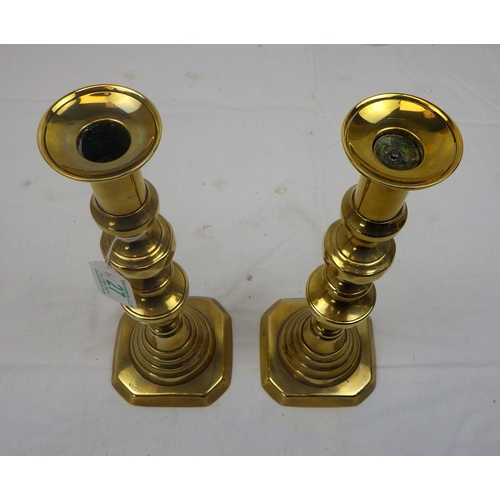 27 - A pair of 19thC brass candlesticks af 30cm tall, From the collection of the late Mr Darrell Buttery.