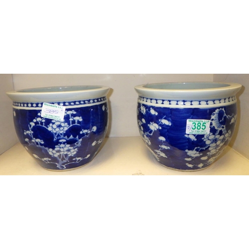 385 - A pair of Oriental Peony planters 16cm tall.  One a/f having star crack to base. - from the estate o... 