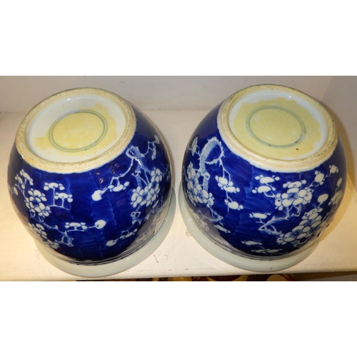 385 - A pair of Oriental Peony planters 16cm tall.  One a/f having star crack to base. - from the estate o... 