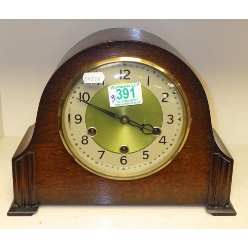 391 - Three oak cased mantle clocks