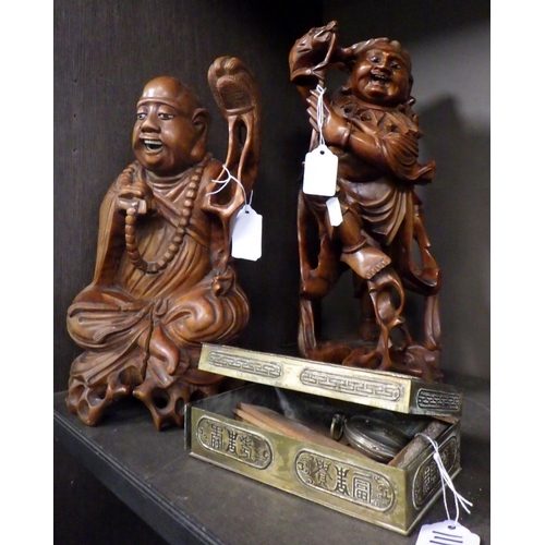 111 - Two carved Oriental figures together with a small metal box af (3)