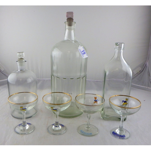 15 - A large clear glass Poison bottle together with further bottles and four Babycham glasses (7)