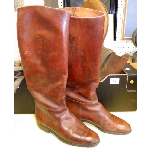 41 - A pair of brown leather boots together with a saddle and misc tack