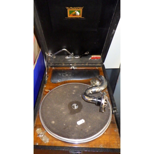 46 - A table top HMV wind up gramophone together with a qty of records (2)