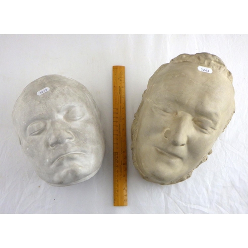 100 - Two plaster death masks depicting composers Beethoven and Wagner.