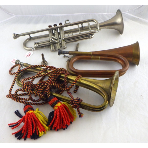 117 - Two bugles, a silver plated trumpet, two spare mouth pieces.
