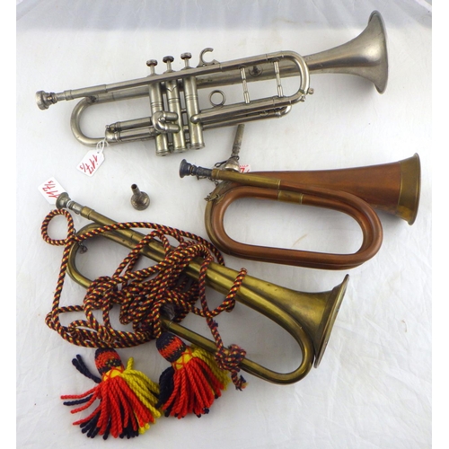 117 - Two bugles, a silver plated trumpet, two spare mouth pieces.