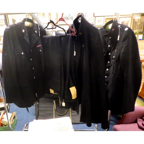 121 - York Police interest uniform items comprising two jackets; two pairs of un-used trousers; a cape. c1... 