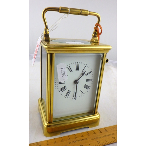149 - A brass cased chiming carriage clock