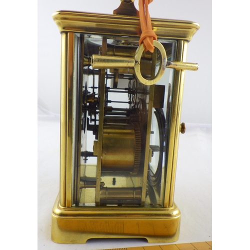 149 - A brass cased chiming carriage clock