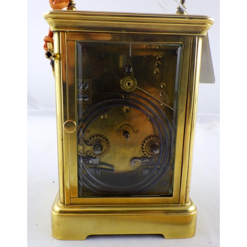 149 - A brass cased chiming carriage clock