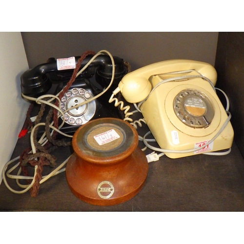 161 - Two vintage telephones together with a stand (3)