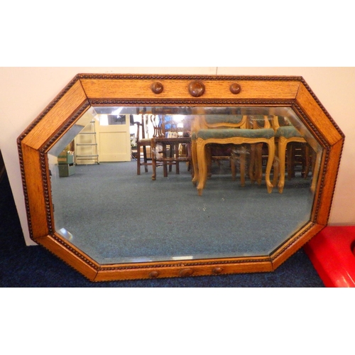 202 - A 19thC rosewood mirror together with a 1930s oak bevelled mirror (2)