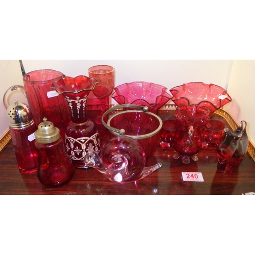 240 - A group of various cranberry glass, paperweights etc