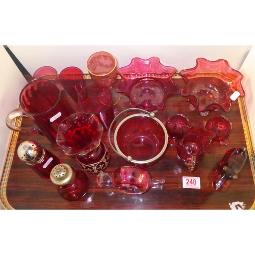 240 - A group of various cranberry glass, paperweights etc