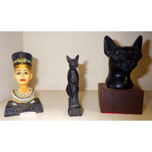 282 - A cased Egyptian cat together with similar cats and a head (4)