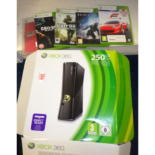 304 - A XBOX 360 together with games