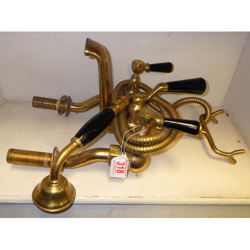 318 - A brass bath tap