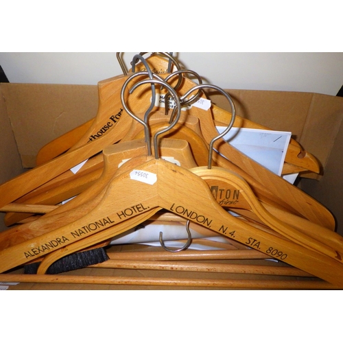 337 - A qty of wooden coat hangers incl advertising / retail examples.