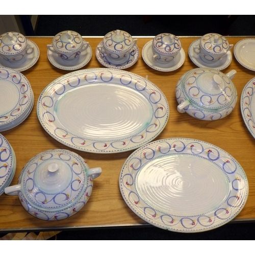 411 - A group of Clarice Cliff dinner ware