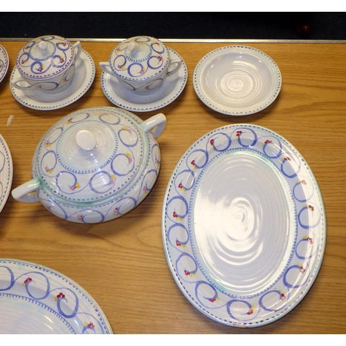 411 - A group of Clarice Cliff dinner ware