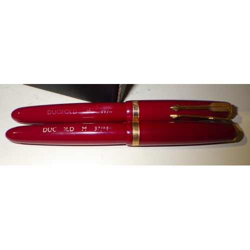 443 - Two Parker DuoFold fountain pens, ex-retail sample stock with bold print model name and price number... 