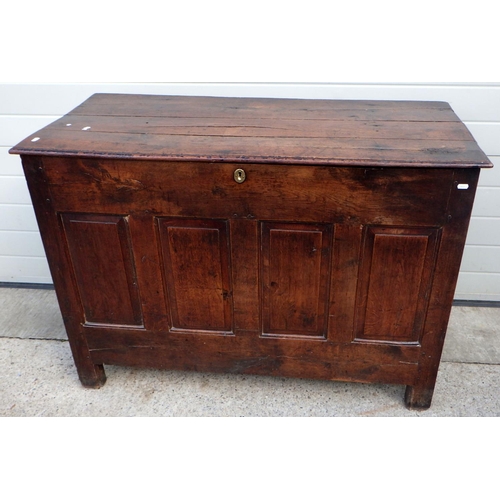 611 - A panelled oak blanket box, 121cm wide, 87cm tall, top loose