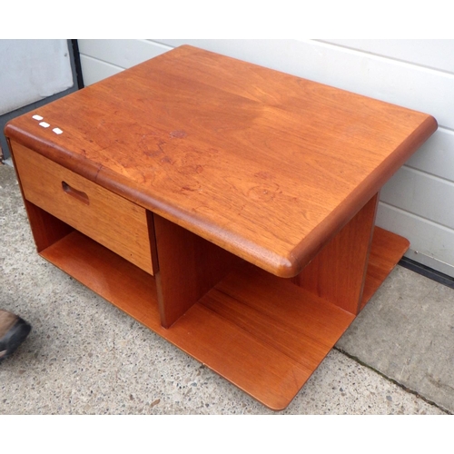 615 - A Meredew teak coffee table, 74cm across