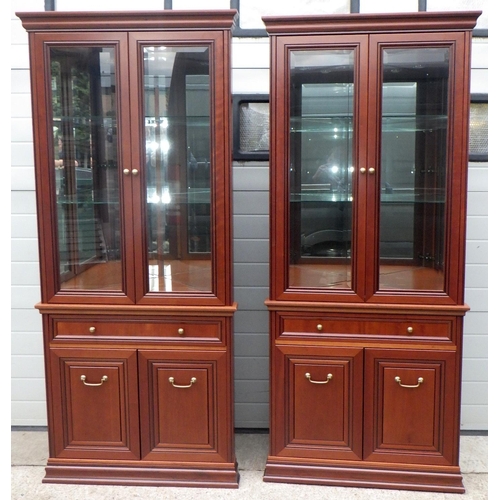 640 - A pair of G.Plan tall corner cabinets, 88cm wide, 198cm tall