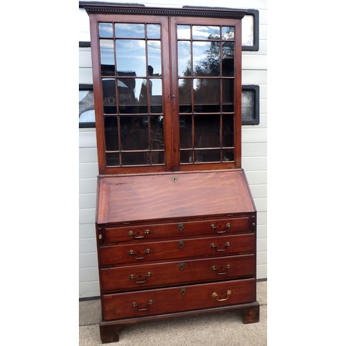 653 - A mahogany bureau bookcase, 110cm wide