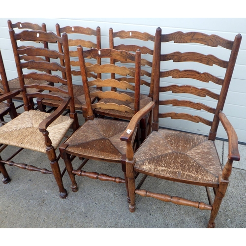 660 - Seven ladderback rush seated chairs, (6&1), a/f