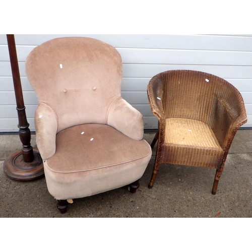 679 - A Lloyd Loom tub chair, upholstered chair and an oak lamp standard (3)